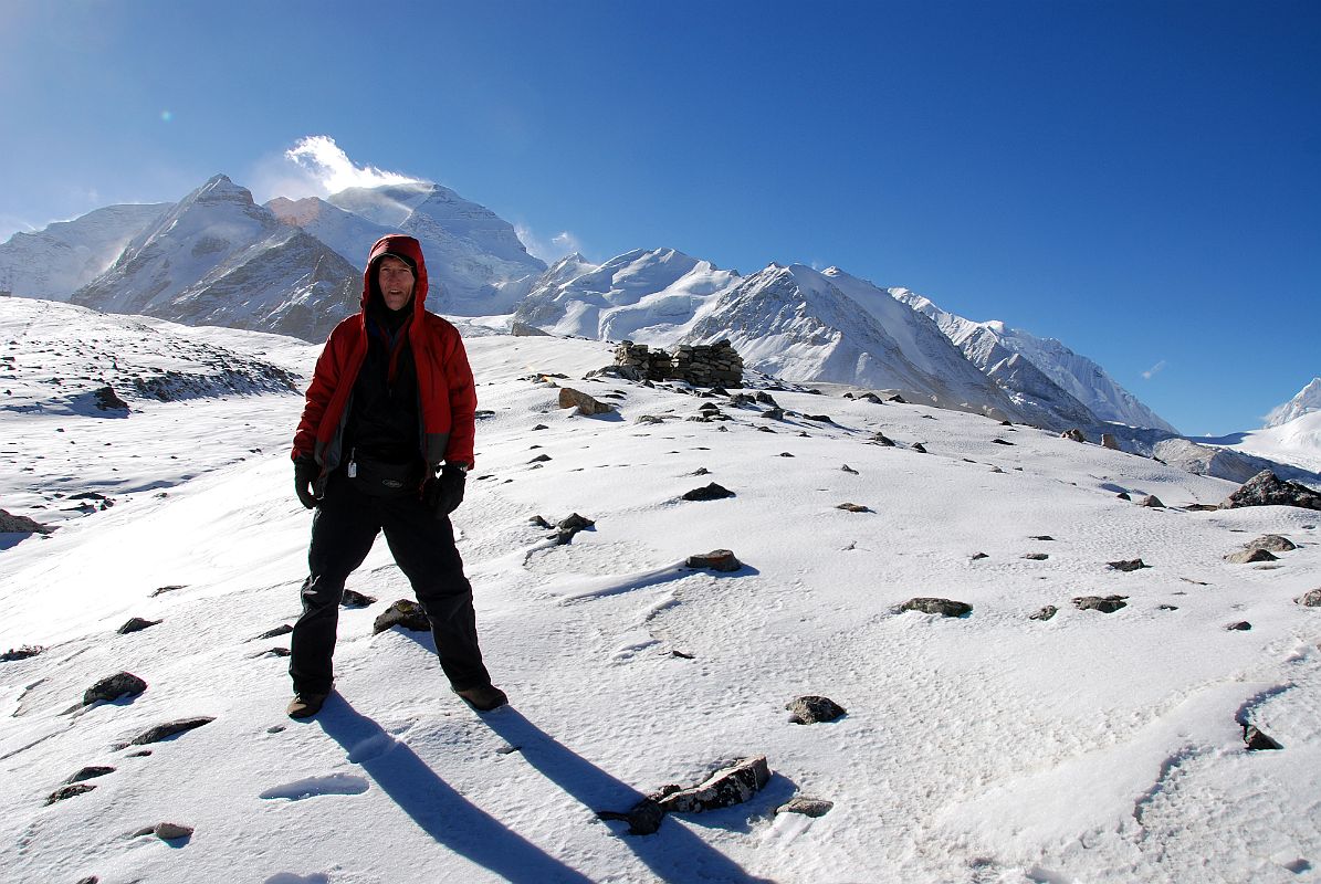 20 Jerome Ryan At Cho Oyu Intermediate Camp Early Morning With Cho Oyu And Nangpa La Behind Jerome Ryan poses in front of Cho Oyu (8201m) from Intermediate Camp (5434m). The Nangpa La is on the right.